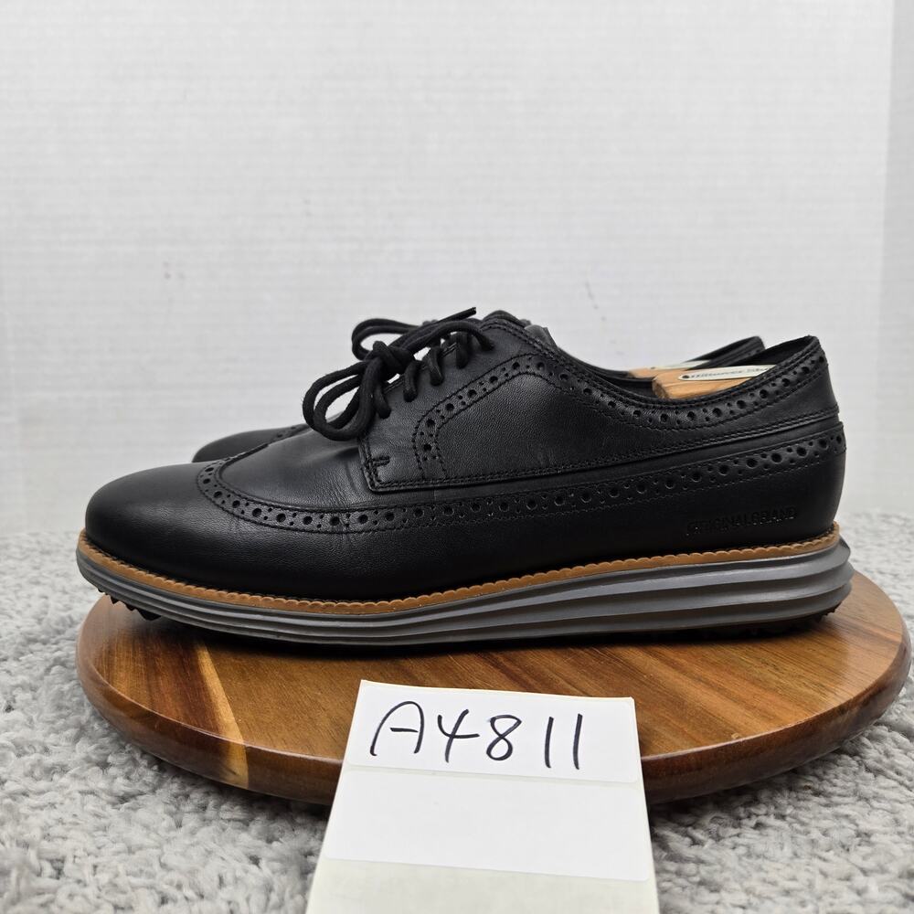 Cole Haan Mens 10.5M OriginalGrand Black Long Wingtip Oxford Spikeless Golf Shoe